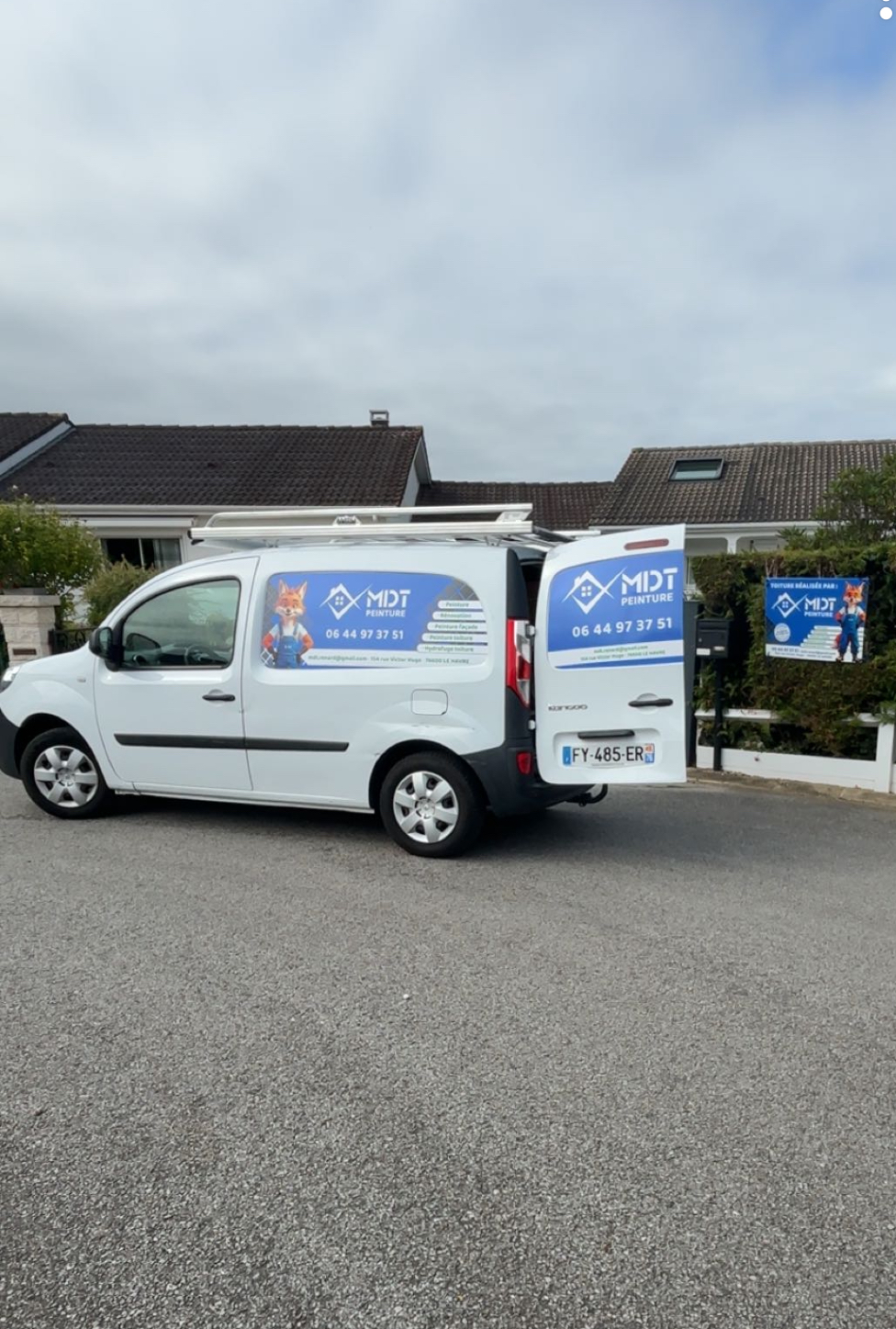 Réalisation MDT Peinture : traitement hydrofuge d'un toit en ardoise